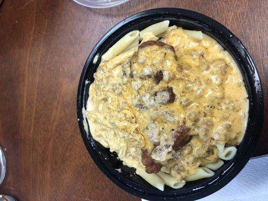 Country style chicken with sausage gravy.