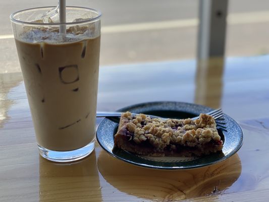 Iced latte and raspberry square.