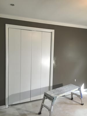 Bedroom in the home. Notice the ceiling paint turning down the wall a bit giving this 7'-6" ceiling the illusion of more height