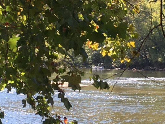 Boaters fishing in the river