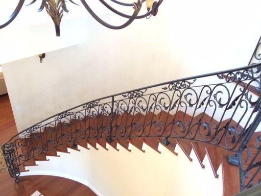 Iron Half Moon Staircase with scroll and leaves