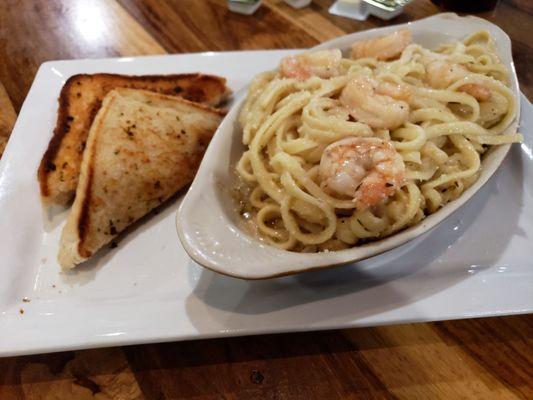 Shrimp Scampi over Linguine served with Garlic bread