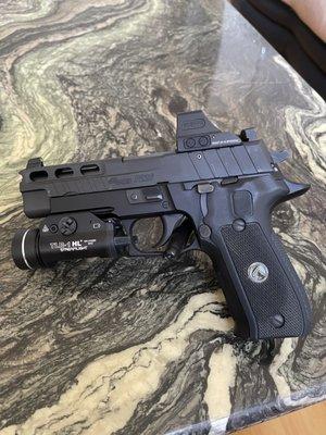 Sig p226 legion with Green dot sight, adapter plate, and suppressor height sights installed.