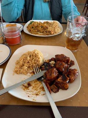 Orange chicken and fried rice , chicken lo main