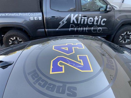 Kobe numbering on a carbon fiber roof