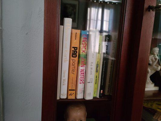 Some books in the John Waters room.