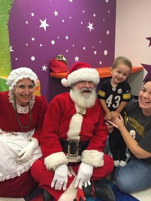 Santa even got on the floor to talk to one of the kids because this little guy was being shy!