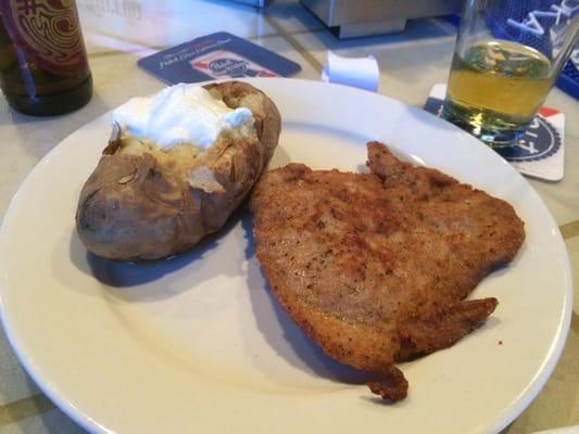 Wienerschnitzel and a baked potato. Fresh pounded and very tasty.