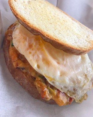 Spicy pimento grilled cheese sandwich with an added fried egg