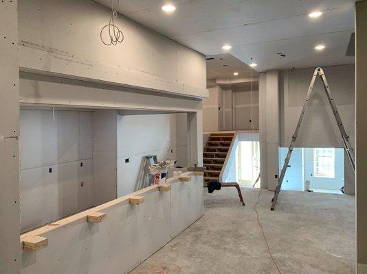 Hung up sheetrock on this custom basement.