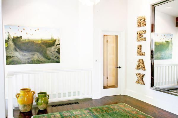 Foyer interior design and custom decor spelling "RELAX"