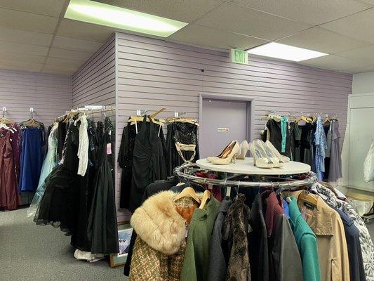 Formal wear and shoes in back of store