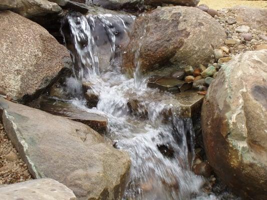 A beautiful water feature adds serenity to your landscape.