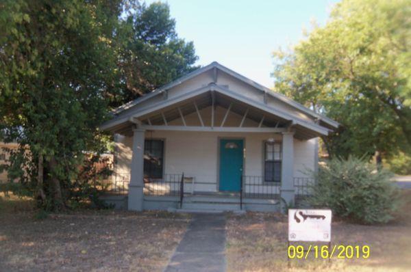 Lovely Craftsman style home in the heart of Devine. Step inside and view the incredible workmanship in the original hard wood floors