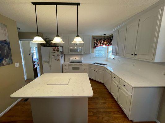 Carrara White Countertops with half bullnose edge