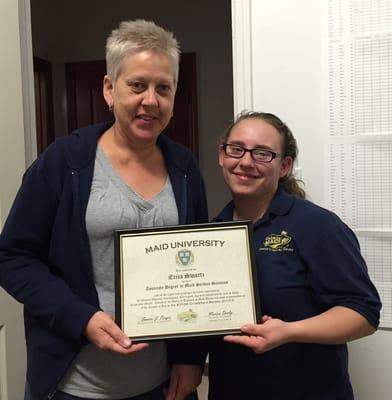 One of our fantastic Trainee Maids receives her Maid University  Diploma