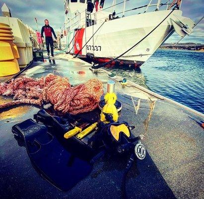 US Coast Guard project: hull cleaning and removal of a large rope stuck in the propeller.