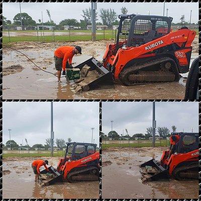 Working in the rain! Kuboya