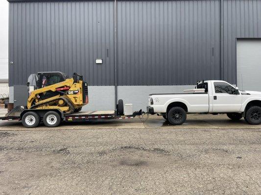 Grading, topsoil, sod, tree removal. Skid steer.