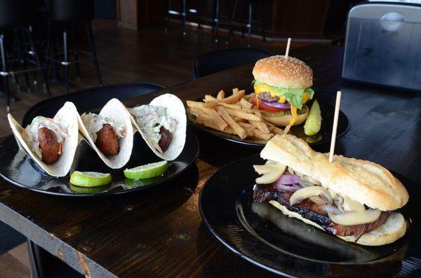 Our famous fish tacos, cheeseburger, and ribeye sandwich.