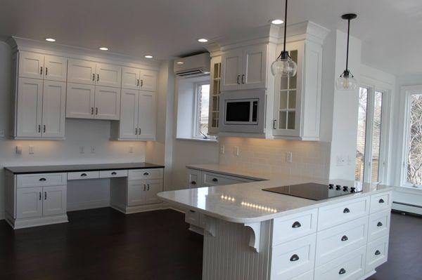 White on white with an accent counter top of black. Perfection!