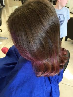 Chalk color is a great way to had a pop of color to hair.  Shampoos out easily, but lets you, or your little one, leave with a fun new do!