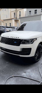 Range rover Wrapped and trim painted in a glass black