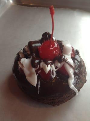 Dessert Specialty Donut. Double Chocolate Cherry Bomb