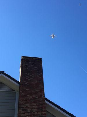 Some times the safest way to inspect the top of the chimney is standing on the ground.