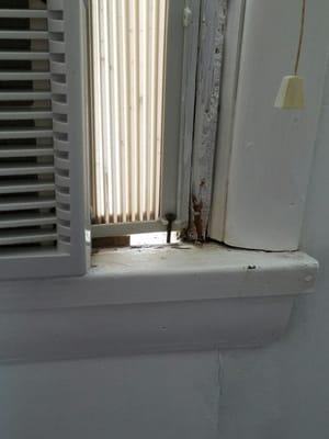 There was also big holes in the window by the AC that let bugs in.