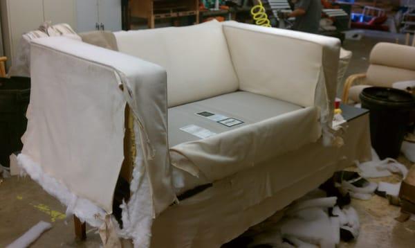 Loveseat during the strip down phase.  All reupholstery is taken to a bare frame so it looks showroom new when done.