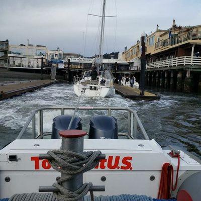 We assisted a boat in clearing the shallow water on the King Tides at Sam's Anchor Cafe in Tiburon, California.