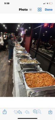 Just some of the food in this picture. Chicken, franchise, sausage and peppers, pan, vodka, chicken, Parm, Caesar salad, Tortellini Alfredo