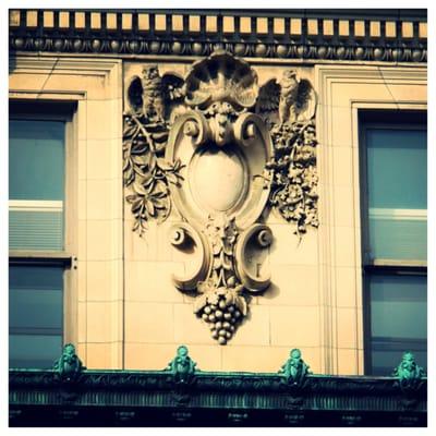 The Wells Building, at 324 East Wisconsin, is protected by a row of Wolves in the green along the bottom of photo.