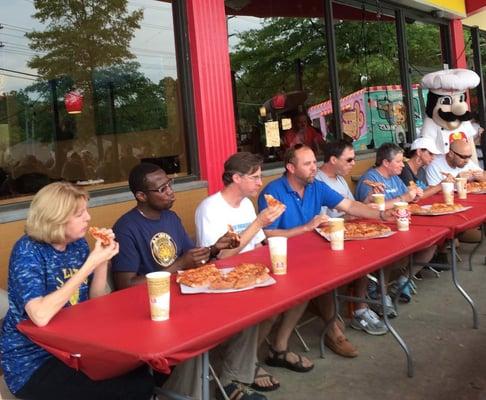 Pizza eating contest with the principals of A. L. Lotts, Bluegrass, Northshore and Rocky Hill schools at the Kids First school fundraiser he