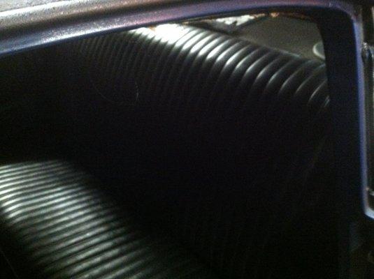 1957 Ford rear seat done with marine heat-pleated vinyl.