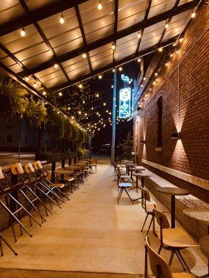 The cutest lit Outdoor patio.