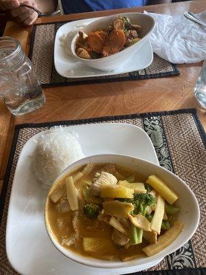 Stir fried yellow curry & Penang curry.  The fried vegetable rolls were so good we ate them before taking a pic! ‍