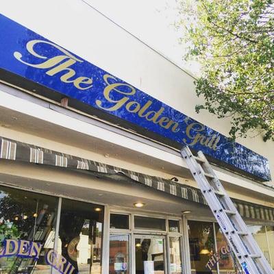 (The Golden Grill) -Storefront Sign Installation.