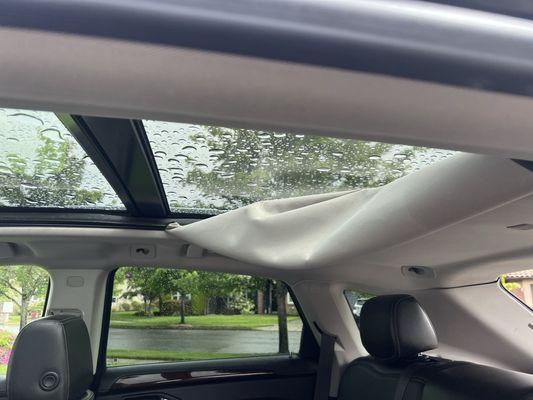 The shitty sunroof in my used car