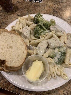 Chef's Chicken Alfredo bake with garlic, homemade bread and melted butter.