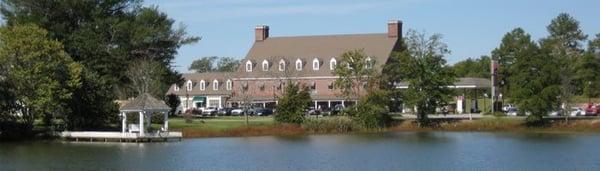 Wide view of the store front from across the highway.