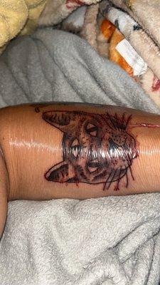 tattoo of cat with three eyes