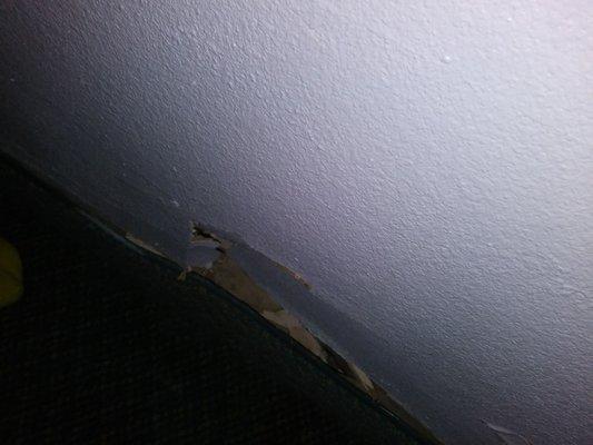 Nice hole in wall next to bed