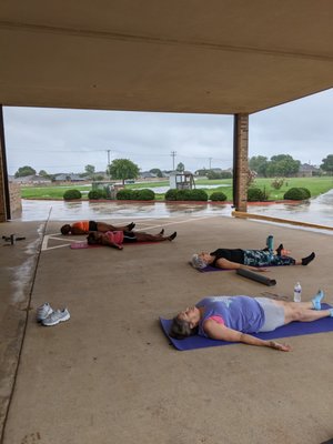 Yoga in a rain shower!