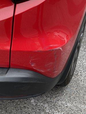 Scratched back bumper. It needed paint to be fixed.