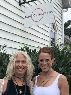 Co-founders Melanie Struble & Jen Kraft with new Body Positive Works sign!