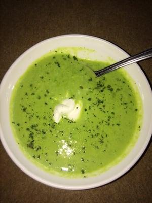 Cream of Sweet pea soup with a dollop of sour cream