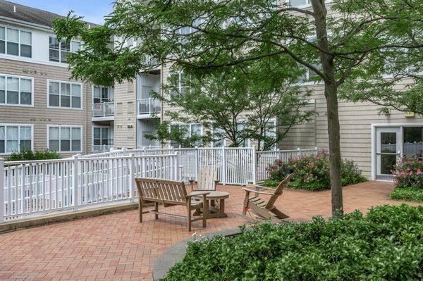 Outdoor seating area with firepits & grills