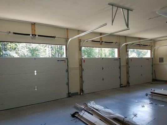 Steel back insulated garage doors